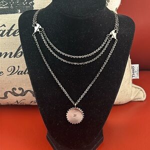 Vintage Karl Lagerfeld black plated silver tone 3 tier necklace with pendant.